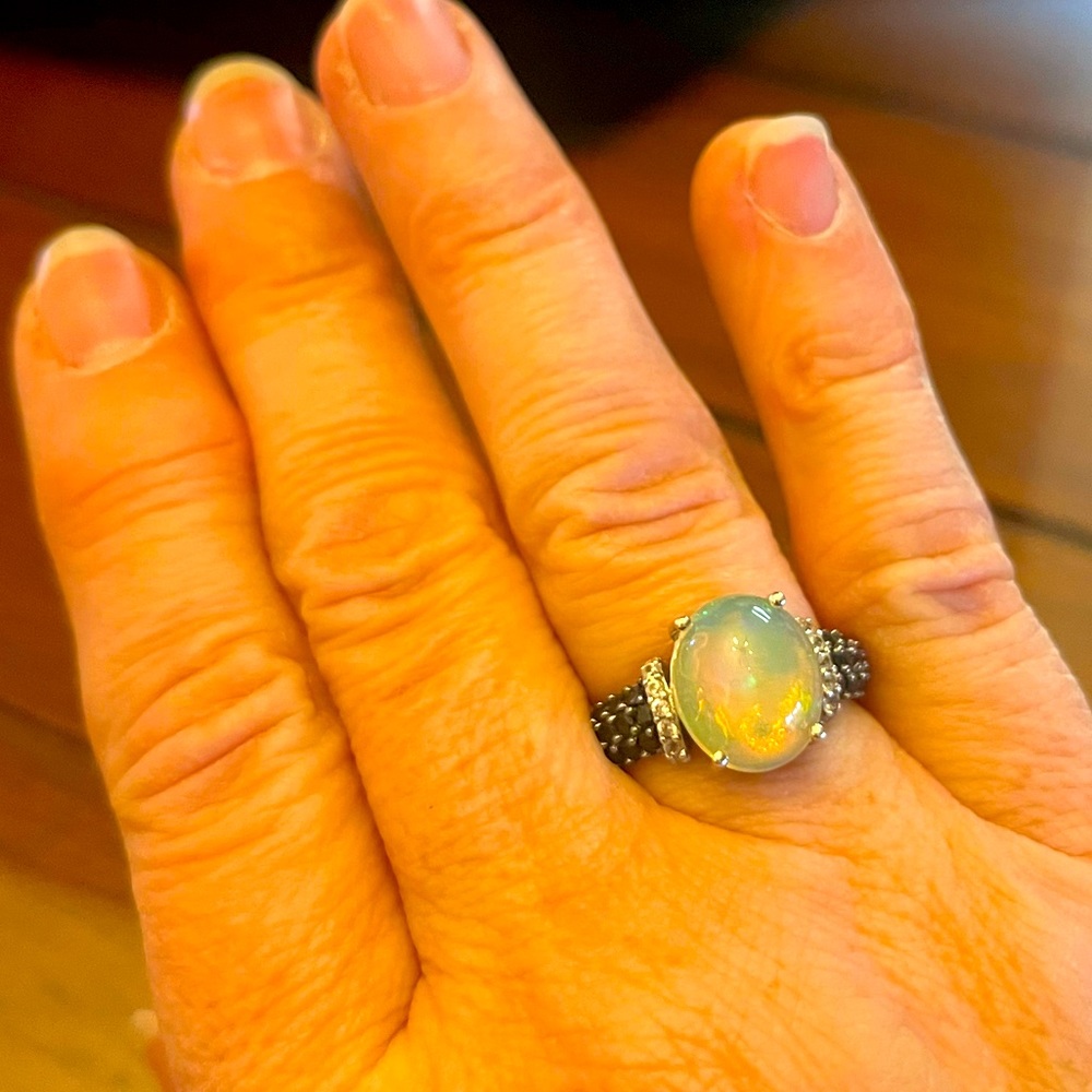 Ethiopian Opal and black spinel ring with diamond accents set in sterling silver